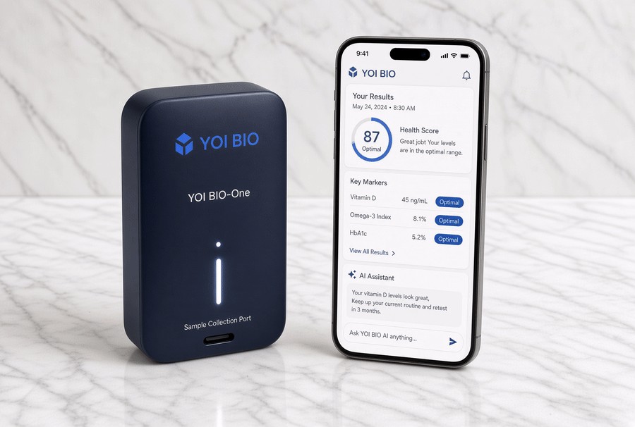 The YOI BIO-One reader next to a phone showing the Yoi Bio app with a health score and key markers
